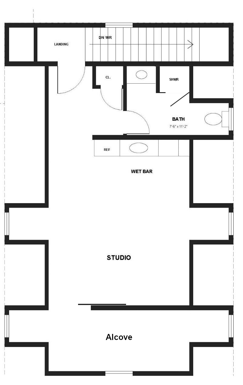 Plan of the existing Carriage House Studio showing the stair and landing, wet bar, full bath with shower, closet, open studio space and an alcove behind a sliding door